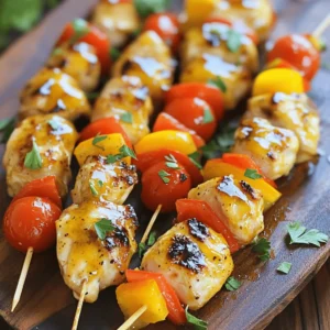 - 1 lb boneless, skinless chicken breasts - 1/4 cup honey - 1/4 cup Dijon mustard - 2 tablespoons low-sodium soy sauce - 1 tablespoon olive oil The main ingredients create a sweet and tangy flavor in your skewers. The honey brings a rich sweetness, while Dijon mustard adds a sharp kick. The soy sauce gives depth, and olive oil keeps everything moist. - 1 cup cherry tomatoes - 1 bell pepper (any color) You can boost the flavor and color by adding cherry tomatoes and bell peppers. They grill nicely and add a pop of freshness to your skewers. - Garlic powder - Onion powder - Smoked paprika - Salt and freshly ground black pepper The seasoning is key to making these skewers shine. Garlic powder and onion powder give great depth. Smoked paprika adds a warm, smoky flavor. Don’t forget to add salt and pepper to enhance all the tastes. For the full recipe, check out the details above. To start, grab a medium mixing bowl. In it, whisk together the following ingredients: - 1/4 cup honey - 1/4 cup Dijon mustard - 2 tablespoons low-sodium soy sauce - 1 tablespoon olive oil Mix these until they blend well. Next, add: - 1 teaspoon garlic powder - 1 teaspoon onion powder - 1/2 teaspoon smoked paprika - Salt and freshly ground black pepper to taste Make sure the mixture is smooth. This honey mustard marinade adds flavor to the chicken. Next, take 1 lb of cubed boneless, skinless chicken breasts. Place them in a large resealable plastic bag or a glass dish. Pour the marinade over the chicken. Ensure each piece gets a good coat. Seal the bag tightly or cover the dish. For the best flavor, refrigerate for at least 1 hour, or overnight if you can wait. This helps the chicken soak up the flavors. When you are ready to grill, preheat your grill or grill pan to medium-high heat. If you use wooden skewers, soak them in water for 30 minutes. This prevents them from burning while grilling. Now, you’re set to assemble and grill your skewers. Enjoy the process, as this is when the magic happens! To make a great marinade, mix honey and Dijon mustard well. Add soy sauce, olive oil, garlic powder, onion powder, and smoked paprika. This blend gives your chicken a sweet and tangy flavor. For the best taste, let the chicken marinate overnight in the fridge. If short on time, one hour will work too, but overnight is better. When grilling, heat your grill to medium-high. This heat cooks the chicken evenly. Place the skewers on the grill and turn them every few minutes. This helps them cook without burning. Use a meat thermometer to check if the chicken is done. It should reach 165°F (75°C) inside. For serving, arrange your skewers on a big platter. Drizzle extra honey mustard sauce on top to make it look pretty. You can add fresh parsley for color. Serve with a salad or grilled veggies for a full meal. This makes the dish inviting and tasty! {{image_4}} You can change the chicken type for your skewers. Chicken thighs have more flavor and stay juicy. They are great if you like tender meat. Chicken breasts are lean and cook faster. Both options work well in this recipe. For sweeteners, honey is classic, but try maple syrup for a twist. Agave syrup is another option. It adds a mild sweetness that complements the mustard flavor. You can bake these skewers in the oven. Preheat the oven to 400°F. Place the skewers on a baking sheet. Bake for 15-20 minutes until cooked through. This method is easy and works well year-round. For stovetop grilling, use a grill pan. This is great in colder months. Heat the pan over medium-high heat and add the skewers. Cook until they are golden brown and reach the right temperature. Want to spice things up? Add cayenne pepper for heat. A little goes a long way. You can also mix in herbs like rosemary or thyme. Fresh herbs elevate the dish and add aroma. These variations let you make honey mustard chicken skewers your own. Each change can create a new experience. Enjoy experimenting and find your favorite combination. Check out the Full Recipe for more details. To keep your cooked honey mustard chicken skewers fresh, store them in the fridge. Place the skewers in an airtight container. Use a glass or plastic container with a tight lid. This keeps moisture in and prevents odors from other foods. When reheating leftover skewers, the oven works best. Preheat it to 350°F (175°C). Place the skewers on a baking sheet lined with foil. Cover them with foil to keep the chicken moist. Heat for about 10-15 minutes or until warm. You can also use the microwave. Heat on medium for 1-2 minutes, checking often. This keeps the chicken juicy. To freeze leftover skewers, let them cool completely first. Wrap them tightly in plastic wrap, then in aluminum foil. This helps avoid freezer burn. Place the wrapped skewers in a freezer bag for added protection. When ready to eat, thaw them in the fridge overnight. For best texture, reheat them in the oven. This way, they taste just as good as when you first made them. You can find the full recipe for honey mustard chicken skewers above. For the best flavor, marinate the chicken for at least 1 hour. However, letting it sit overnight gives you the best taste. During marination, the honey and mustard soak into the chicken. This creates tender, juicy bites full of flavor. Yes, you can use other proteins! Shrimp works great and cooks fast. Tofu is a wonderful option for a vegetarian choice. Just make sure to adjust the marination time based on the protein. For shrimp, 30 minutes is enough. Tofu can marinate for 1 hour or more. These skewers pair well with many sides. Fresh salads add a nice crunch. Grilled vegetables like zucchini and bell peppers enhance the meal. Rice or quinoa can also round out your plate. The options are endless, so feel free to get creative! To check if the chicken is done, use a meat thermometer. The internal temperature should reach 165°F (75°C). You can also look for clear juices when you cut into the chicken. No pink should remain. Golden grill marks and a nice char are good signs, too. Honey mustard chicken skewers are easy to make and tasty. We covered essential ingredients, marinade steps, and grilling tips. I shared how to store leftovers and suggested variations, too. Remember, marinate for flavor and check the chicken's temperature. With these tips, your skewers will impress. Get ready to enjoy your delicious meal!