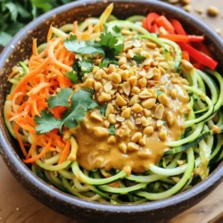 For a tasty Zucchini Noodle Pad Thai, you need the right ingredients. Here’s what you’ll use: - 4 medium zucchinis, spiralized into noodles - 1 cup fresh bean sprouts - 1 cup shredded carrots - 1 red bell pepper, thinly sliced into strips - 3 green onions, chopped finely - 2 cloves garlic, minced - 1 tablespoon fresh ginger, grated - 3 tablespoons creamy peanut butter (or almond butter for a nuttier flavor) - 2 tablespoons soy sauce (or tamari for a gluten-free option) - 2 tablespoons fresh lime juice - 1 tablespoon fragrant sesame oil - 1 teaspoon chili paste (adjust according to your spice preference) - 1/4 cup roasted peanuts, roughly chopped for garnish - Fresh cilantro leaves for garnish These ingredients create a bright and fresh dish. The zucchini noodles replace traditional rice noodles, making it light and healthy. The crunchy veggies add color and texture. The peanut butter and soy sauce blend for a creamy, savory sauce. Each bite bursts with flavor, and the garnishes take it to the next level. You can check out the Full Recipe for detailed steps and tips! Spiralizing the zucchinis First, grab your spiralizer or a vegetable peeler. Take the zucchinis and turn them into noodle-like strands. This step is fun and easy. Place the spiralized zucchini in a bowl and set it aside for later. Sautéing the aromatics and vegetables Next, heat your skillet or wok over medium-high heat. Add the sesame oil. Once it's hot, toss in the minced garlic and grated ginger. Sauté these for about 30 seconds. You want to smell those wonderful aromas! Then, add the sliced red bell pepper and shredded carrots. Cook them for 2-3 minutes. They should soften but still have a nice crunch. Combining with sauce and serving Now it’s time for the star of the show: the zucchini noodles. Gently add them to the skillet. Cook for another 2-3 minutes, stirring gently. You want to keep them firm. In a separate bowl, whisk together the peanut butter, soy sauce, lime juice, and chili paste. Pour this sauce over the veggies and noodles in the skillet. Stir well to coat everything evenly. Finally, add the fresh bean sprouts and chopped green onions. Toss everything together until heated through. Serve your dish hot, topped with chopped roasted peanuts and fresh cilantro leaves. For the full recipe, check out the complete details above. Enjoy your colorful and tasty Zucchini Noodle Pad Thai! Maintaining the texture of zucchini noodles To keep zucchini noodles firm, avoid cooking them too long. Sauté them just until they warm. This keeps them crunchy and tasty. If you want more texture, you can briefly salt the noodles before cooking. This draws out some moisture. Adjusting spice levels If you love spice, add more chili paste. Start with one teaspoon, and taste as you go. You can always add more but can’t take it out once mixed. For a milder dish, reduce the chili paste. You can also use sweet chili sauce for a sweet twist. Importance of fresh ingredients Using fresh veggies makes a big difference. Crisp bell peppers and vibrant green onions boost flavor and color. Fresh lime juice adds brightness, while garlic and ginger give depth. Always choose the best ingredients you can find. This will lift your dish and impress your guests. For the full recipe, check out the Zucchini Noodle Pad Thai 🥒 section. {{image_4}} You can easily change this Zucchini Noodle Pad Thai to fit your diet. - Vegan substitutions: To make this dish vegan, use plant-based peanut butter and tamari. This keeps the creamy texture and flavor without animal products. - Gluten-free options: If you need gluten-free, swap soy sauce for tamari. It tastes great and keeps your dish safe for those with gluten issues. - Adding protein sources: If you want more protein, add tofu, chickpeas, or cooked chicken. Tofu is a great vegan option. Just sauté it until golden brown before mixing it with the other veggies. These adaptations make this dish flexible. You can enjoy it no matter your dietary needs. For the full recipe, check the Zucchini Noodle Pad Thai 🥒 section. To keep your Zucchini Noodle Pad Thai fresh, store leftovers in an airtight container. Place the container in the fridge. This dish stays good for 2-3 days if stored properly. When you're ready to eat, reheating is key. Use a skillet over low heat. Add a splash of water to help steam the noodles. This method keeps them from turning mushy. Stir gently as they warm up to maintain their texture. If you have extra sauce, heat it up separately. This way, you can add it for extra flavor when serving. Enjoy your delicious leftovers just like the first time! Can I make this dish ahead of time? Yes, you can prepare some parts in advance. Spiralize the zucchinis and chop the veggies ahead of time. Store them in the fridge. This makes cooking quick and easy. However, I suggest making the sauce fresh for the best flavor. How do I store zucchini noodles? Store zucchini noodles in an airtight container. Place a paper towel in the container to absorb excess moisture. This keeps them fresh for about 2-3 days. Avoid freezing them, as it changes the texture. What can I use instead of peanut butter? If you need a swap, try almond butter. It adds a nice nutty taste. Sunflower seed butter also works well for a nut-free option. Each choice gives a unique flavor, so feel free to experiment. - Full Recipe Reference: Zucchini Noodle Pad Thai 🥒 In this blog post, we explored how to create a tasty Zucchini Noodle Pad Thai. We covered the main ingredients, including the fresh veggies and sauces. The step-by-step guide made cooking easy. Tips helped maintain the perfect texture. We discussed dietary options for everyone, plus ways to store and reheat leftovers. Overall, making this dish is simple and fun. With these ideas, you can enjoy a healthy twist on a classic favorite. Dive into your kitchen and give it a try!